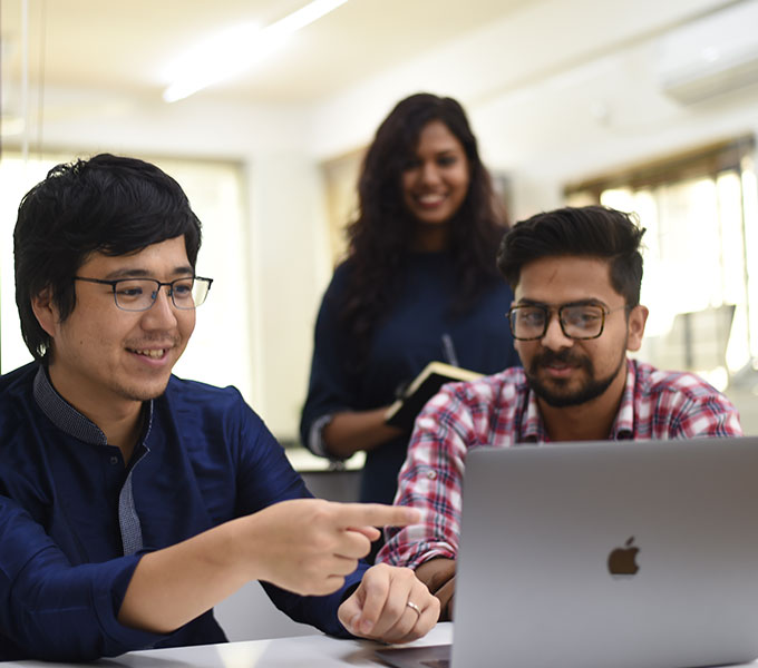 Three team members planning a strategy